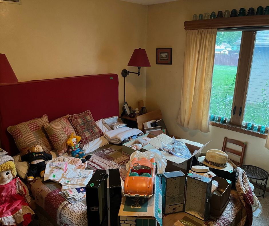 Before: home filled with furniture and belongings prior to cleanout
